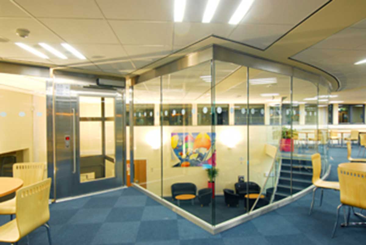 Glass cladding barrier in office