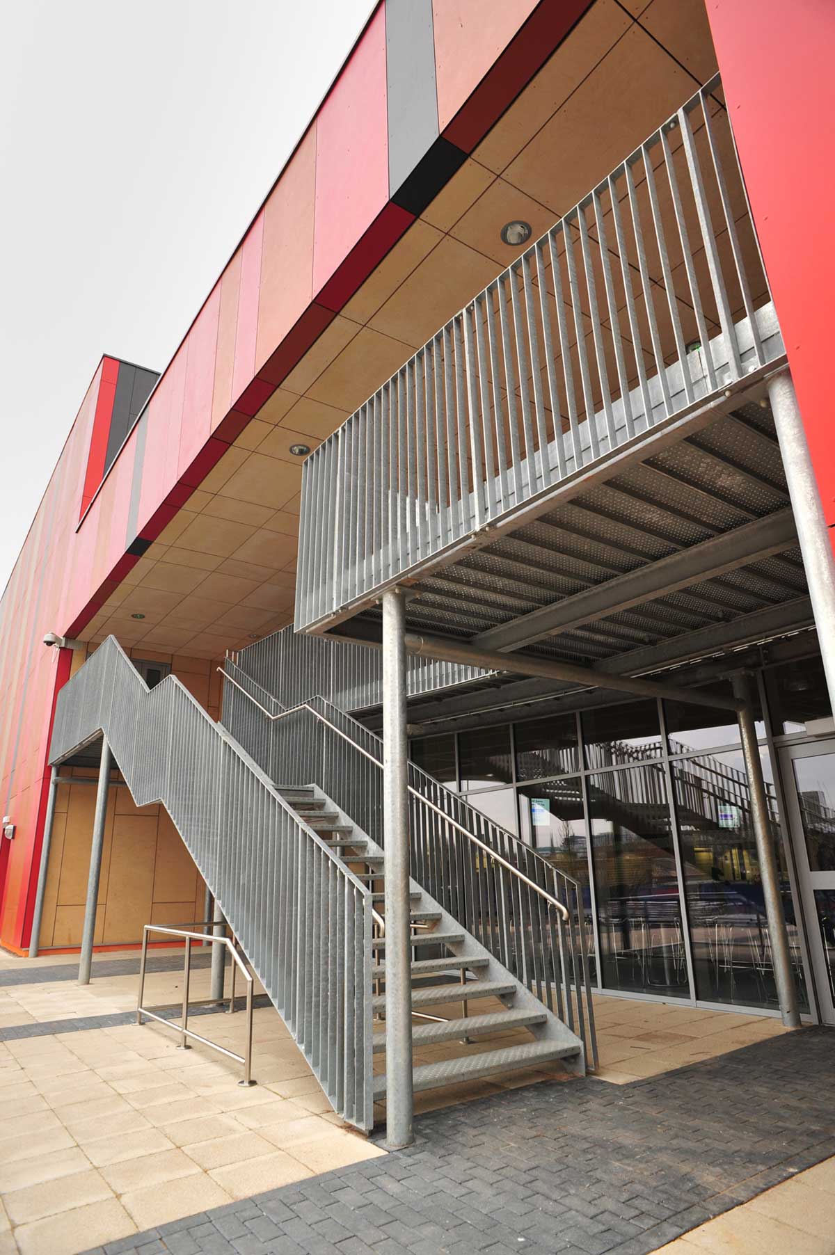 Steel staircase leading to mezzanine floor